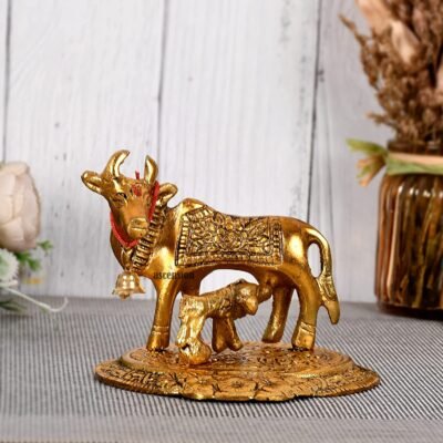 Kamdhenu cow with calf Kamdhenu cow with calf brass Kamdhenu cow with calf statue Kamdhenu cow with calf metal Kamdhenu cow with calf figurine metal idol statue Kamdhenu cow with calf for home décor Metal statues