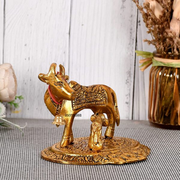 Kamdhenu cow with calf Kamdhenu cow with calf brass Kamdhenu cow with calf statue Kamdhenu cow with calf metal Kamdhenu cow with calf figurine metal idol statue Kamdhenu cow with calf for home décor Metal statues