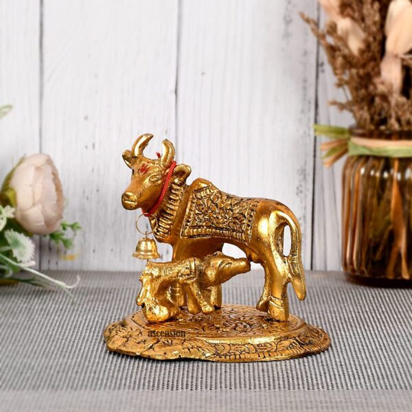 Kamdhenu cow with calf Kamdhenu cow with calf brass Kamdhenu cow with calf statue Kamdhenu cow with calf metal Kamdhenu cow with calf figurine metal idol statue Kamdhenu cow with calf for home décor Metal statues