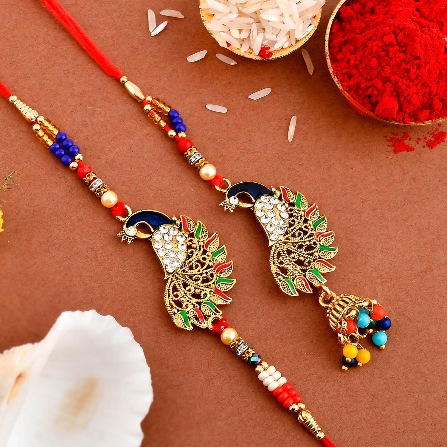 peacock designer couple rakhi