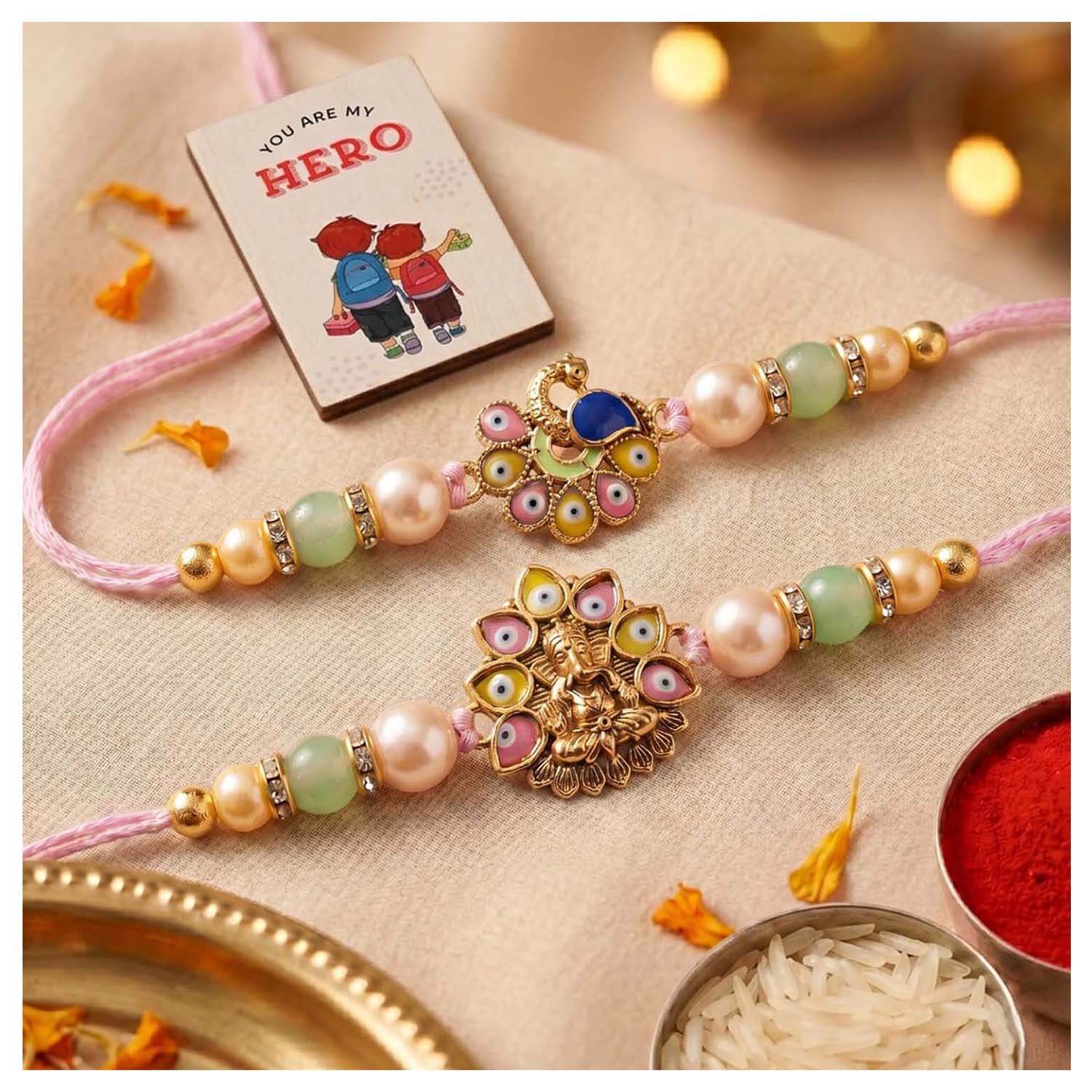 Ascension Designer Ganesha & Peacock Rakhi Set for Brother, Bhai Rakhi for Bhaiya & Sister Bracelet with Roli Tilak & You are My Hero Fridge Magnet for Raksha Bandhan Gift