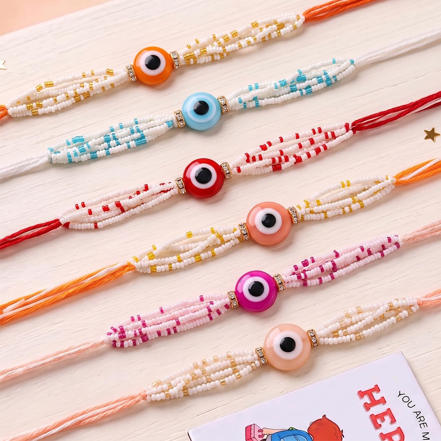 ascension Set of 6 Evil Eye Designer Rakhi Set for Brother, Bhai Combo for Bhaiya & Sister Bracelet with Roli Tilak & You are My Hero Fridge Magnet for Raksha Bandhan Gift