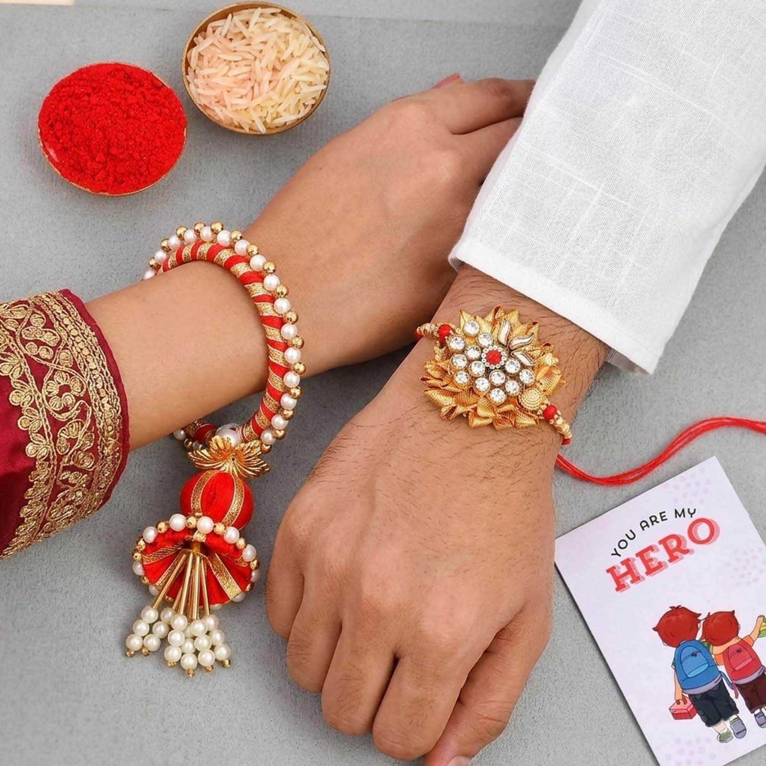 Ascension Modern Multicolour Couple Rakhi Set for Brother and Bhabhi with You are My Hero Fridge Magnet & Roli Tilak