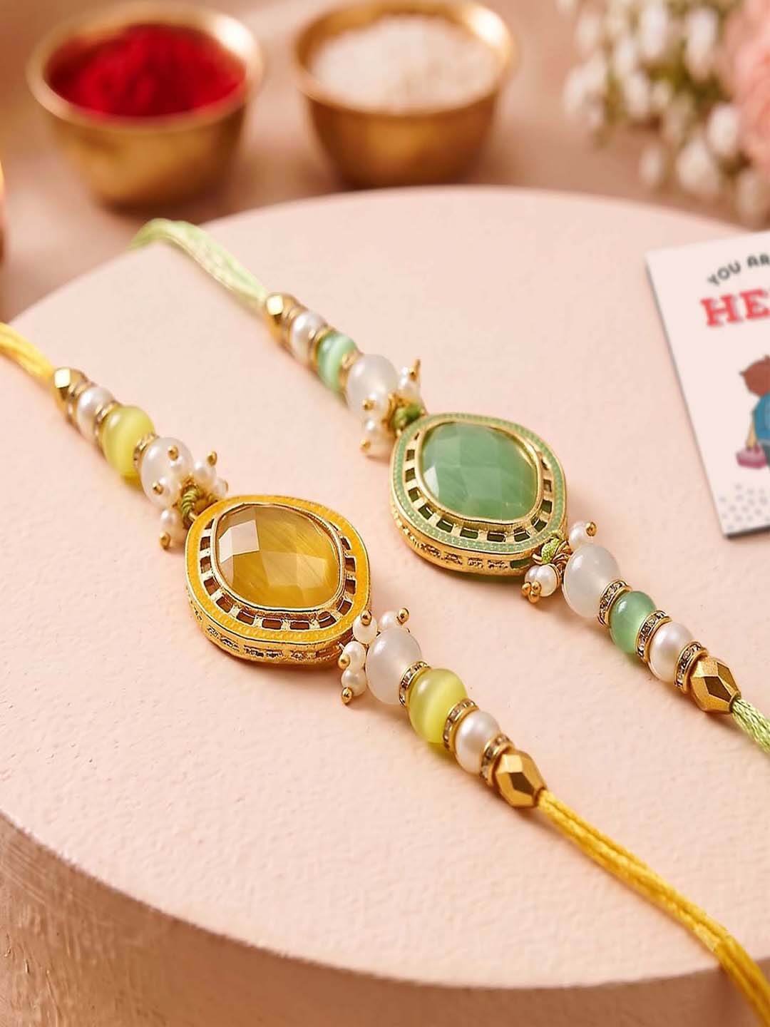 ascension Set of 2 with Yellow & Green, Pearl Beads Rakhi Set for Brother, Bhai Bhaiya & Sister Bracelet with Roli Tilak & You are My Hero Fridge Magnet for Raksha Bandhan Gift