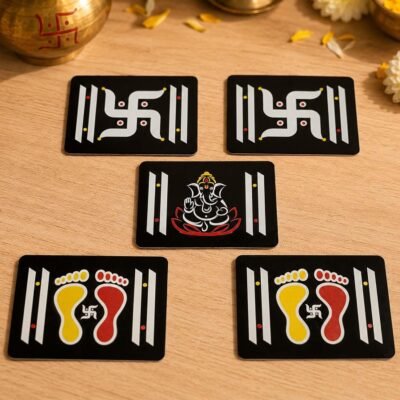 Set of black rangoli stencils with Swastik, Ganesha and Charan designs