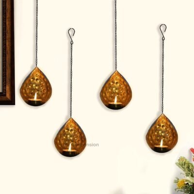 Golden teardrop hammered metal wall hanging tealight candle holders hanging from chains