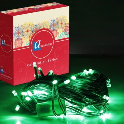 Green fairy string lights bundled next to decorative packaging