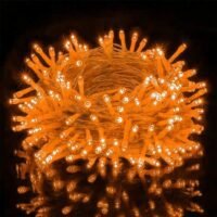 Orange fairy string lights glowing brightly in a dense bundle