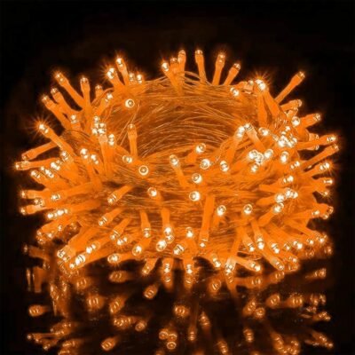 Orange fairy string lights glowing brightly in a dense bundle