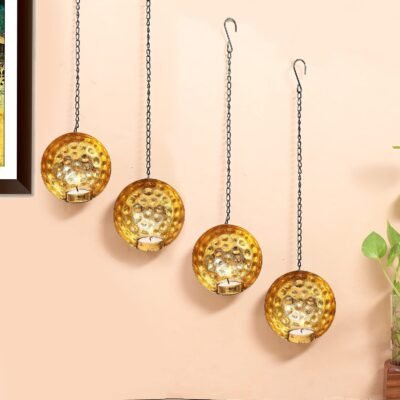 Golden hammered metal wall hanging tealight candle holders hanging from long chains