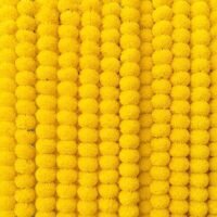 Densely packed 5 Pcs Yellow Handmade Artificial Marigold Flowers arranged vertically to form a bright backdrop.