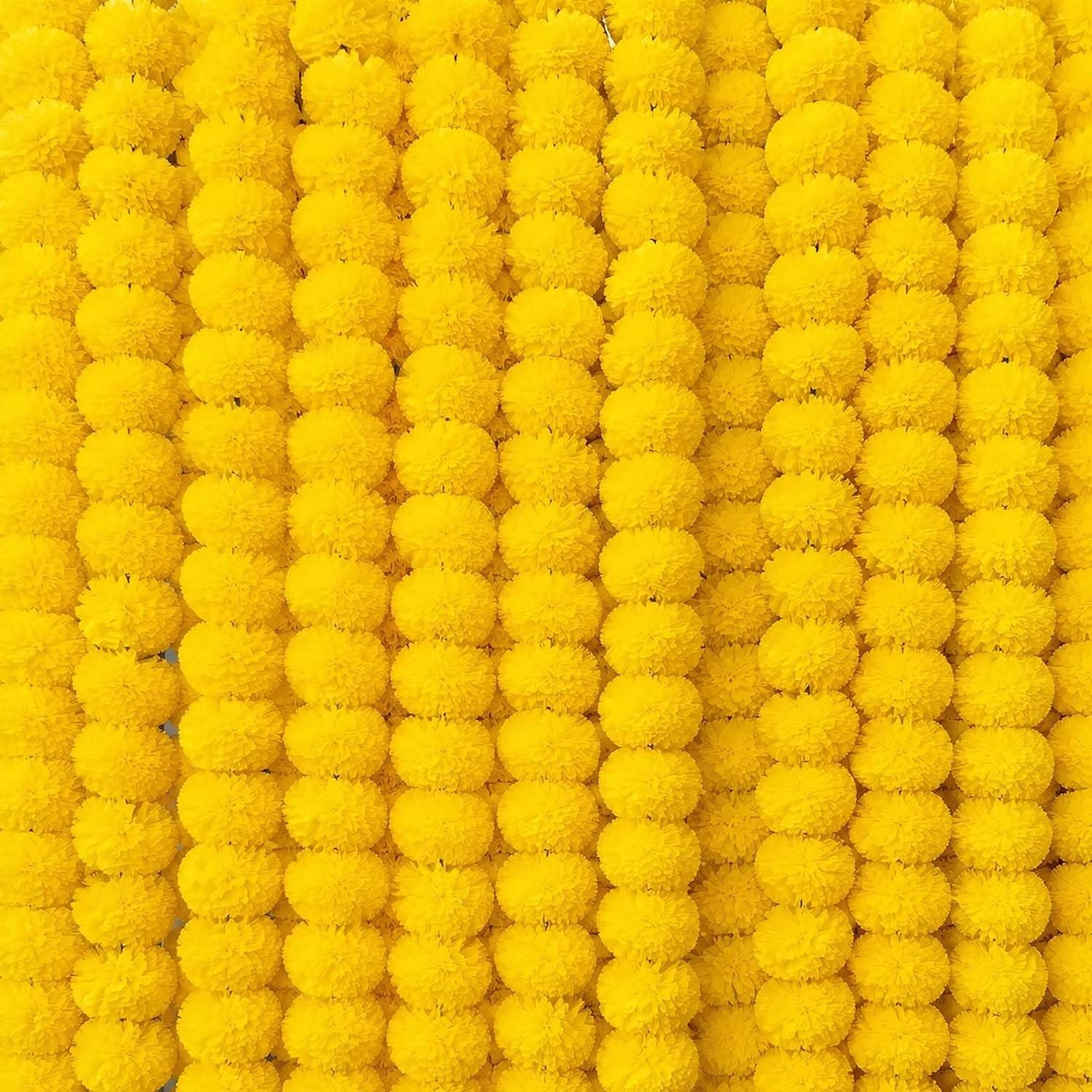 Densely packed 5 Pcs Yellow Handmade Artificial Marigold Flowers arranged vertically to form a bright backdrop.