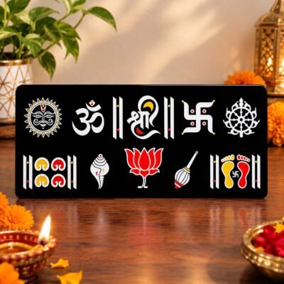 Black decorative Hindu religious symbols wall plaque with Om, Shree, Swastik, lotus, conch shell and sacred footprints