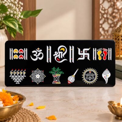 Black decorative Hindu religious symbols wall plaque with Om, Shree, Swastik, lotus, conch shell and sacred footprints