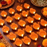 Pack of 24 LED flameless diyas with warm ambient lights and water sensor for Diwali decoration