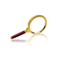 Ascension classic handheld magnifying glass featuring a polished gold rim and red mahogany wooden handle.