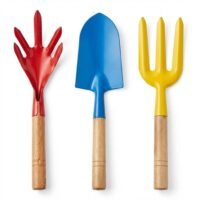 Ascension 3 piece garden hand tool set containing a red rake, blue trowel, and yellow fork with wooden handles.
