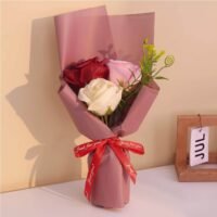 Ascension 3 piece artificial rose bouquet in red pink and white wrapped in mauve paper with a red Just For You ribbon.