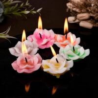 Transform any room into a cozy retreat with our floating flower candles. Crafted in delicate rose shapes, these candles feature vibrant pastel colors like pink, yellow, orange, and green. Each candle floats effortlessly on water, casting a beautiful glow that enhances water bowls, glass vases, and centerpiece arrangements. Artisans design these rose candles with premium wax to ensure a clean, smokeless burn. They burn evenly for hours, making them perfect for romantic dinners, wedding receptions, spa evenings, and festive gatherings. Their soothing flicker relaxes your mind while adding an elegant artistic touch to your decor. Simply fill a decorative bowl with water and place these candles on the surface. Light the wicks to create an unforgettable visual display for your guests. These floating flower candles also make delightful gifts for housewarmings, birthdays, and holidays.