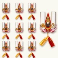 Invoke divine blessings and honor your guests with our Tirupati Balaji Return Gifts Pack of 10. We craft each favor cutout using premium cardstock featuring the iconic deity framed by the traditional Namam, Shankh, and Chakra. Below each cutout hang two tiny bottles filled with auspicious Haldi (turmeric) and Kumkum (vermilion). This 10-piece set provides an effortless way to share auspicious blessings during religious ceremonies. The sacred colors and deity art bring spiritual warmth to your event setup. You can present them directly to guests or place them at prayer altars as divine tokens. These lightweight cutouts serve as ideal favors for Satyanarayan pujas, housewarming functions, Seemantham, and wedding rituals. The hanging string keeps the decorative bottles securely in place. They require zero setup time, saving you effort during event planning. Share divine grace with your family and friends with these meaningful devotional return gifts.