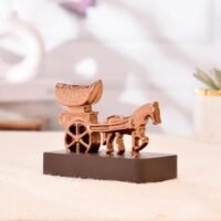 Rose gold metal horse cart chariot showpiece mounted on a brown wooden pedestal base