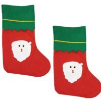 Two red felt Santa face Christmas stockings with green zig-zag cuffs isolated on a white background.