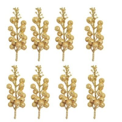 Eight gold glitter berry stems arranged in two rows of four against a solid white background