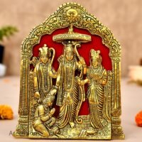 Golden brass Ram Darbar frame featuring Ram Sita Laxman and Hanuman against red velvet