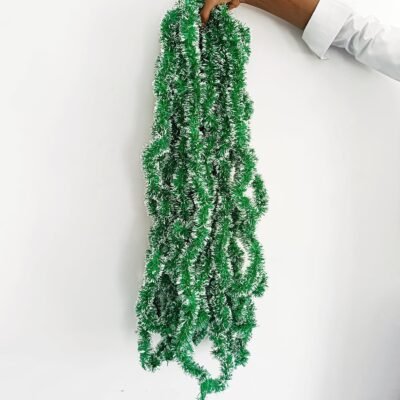 You will absolutely love the incredible flexibility and endless decorating potential of this long holiday garland. The durable, bendable core allows you to effortlessly wrap, twist, and drape the thick tinsel around any architectural feature in your home. You can seamlessly weave it through your winding staircase railings, drape it elegantly across your stone fireplace mantel, or use it to frame your front doorway to welcome holiday guests. It also serves as an outstanding base for your Christmas tree decorations, instantly adding depth and snowy texture before you hang your favorite ornaments.