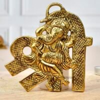 Golden brass Shree character wall hanging featuring Lord Ganesha playing dholak drum