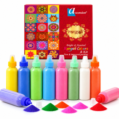 Ascension rangoli colors kit featuring a red box and ten squeeze bottles filled with assorted colorful powders alongside small powder piles.